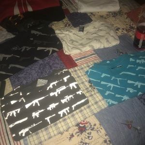 Set of four rogue status shirts size medium